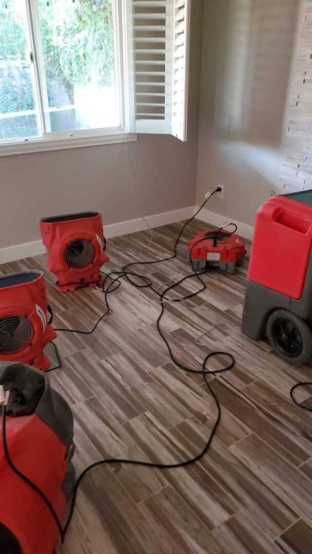Air movers set up to dry a water-damaged room in Las Vegas